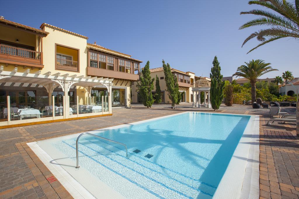 Lopesan Villa del Conde Resort&Thalasso Meloneras Esterno foto A swimming pool